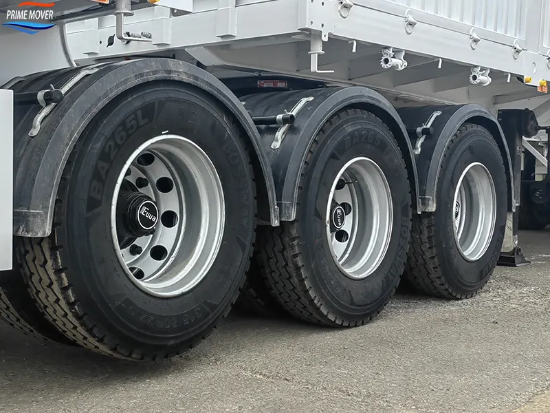 Highway Running Scene – 6-Axle Low-Sided Trailer Hauling Mixed Cargo on Asphalt Road Highway Running Scene – 6-Axle Low-Sided Trailer Hauling Mixed Cargo on Asphalt Road